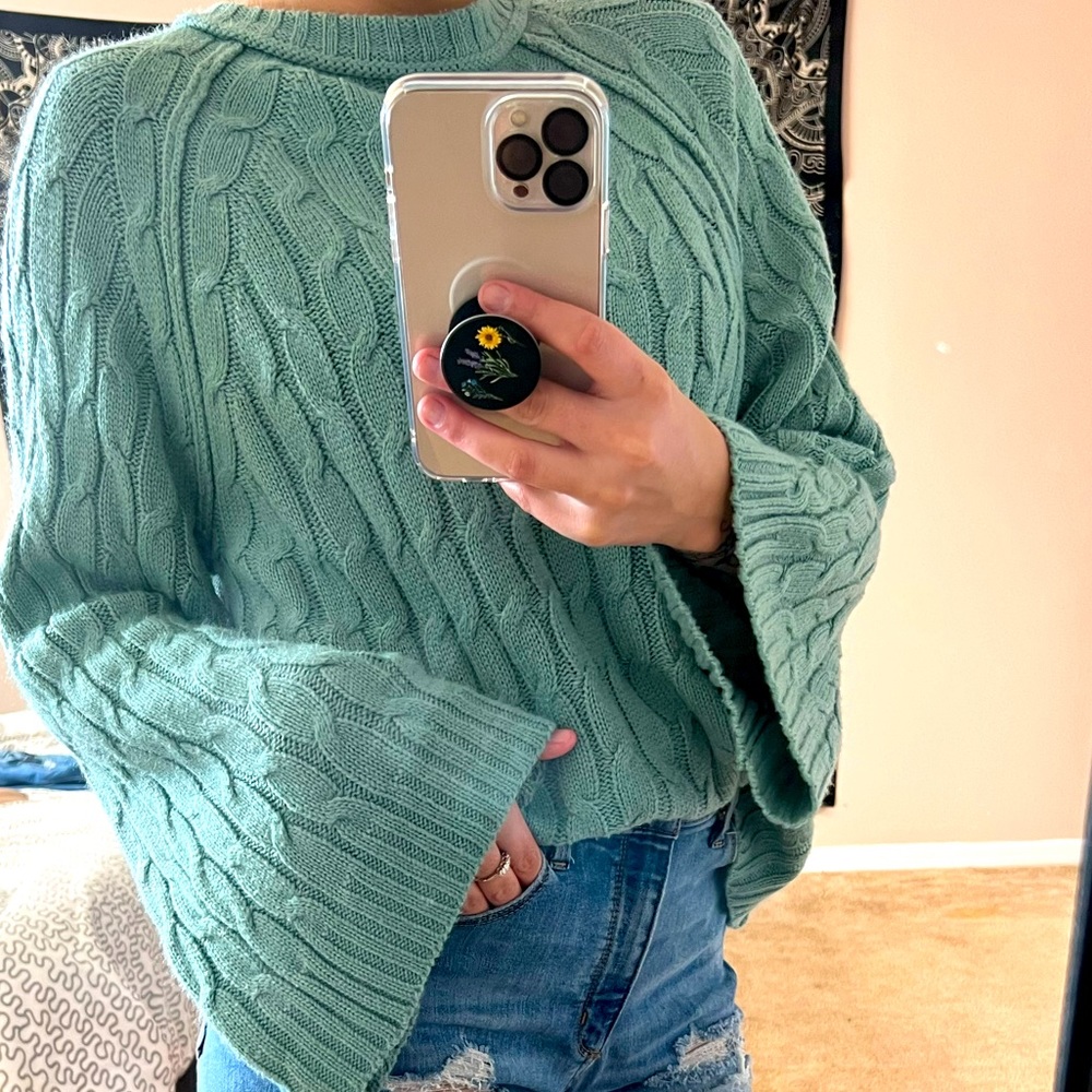 Green knitted sweater